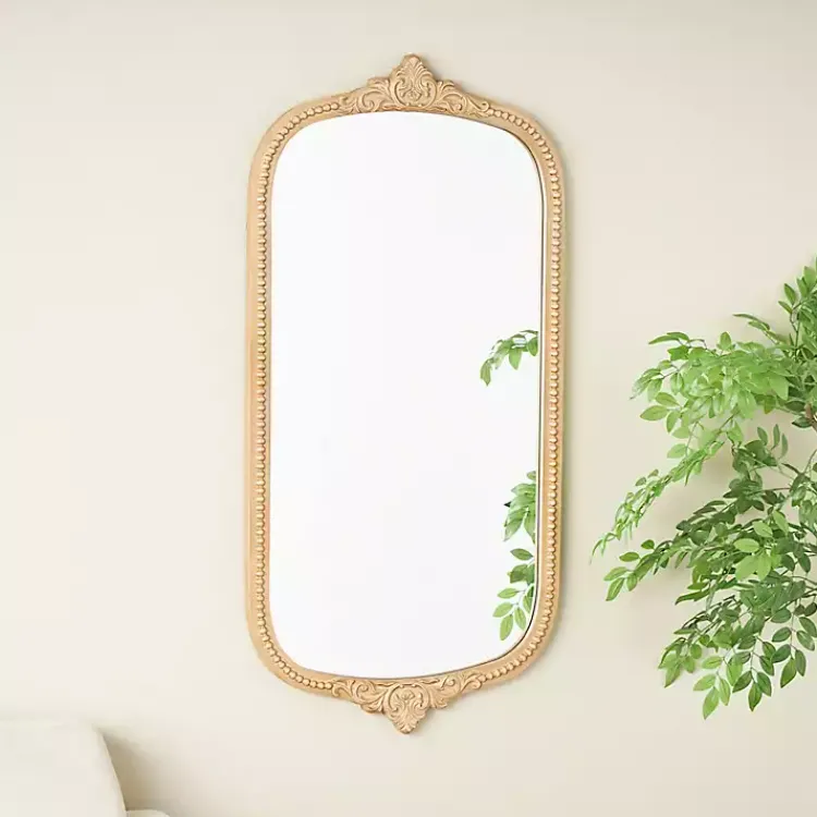 Kirklands Home Gold Beaded Scroll Frame Wall Mirror