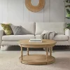 Kirklands Home Natural Wood Finish Turned Leg Round Coffee Table Clearance
