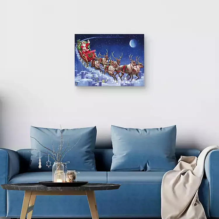 Christmas Art & Wall Decor>Kirklands Home Santa's Flying Sleigh Canvas Art Print Blue