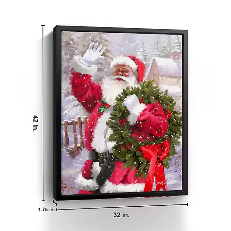 Christmas Art & Wall Decor>Kirklands Home Waving Santa Wreath Framed Canvas Art Print